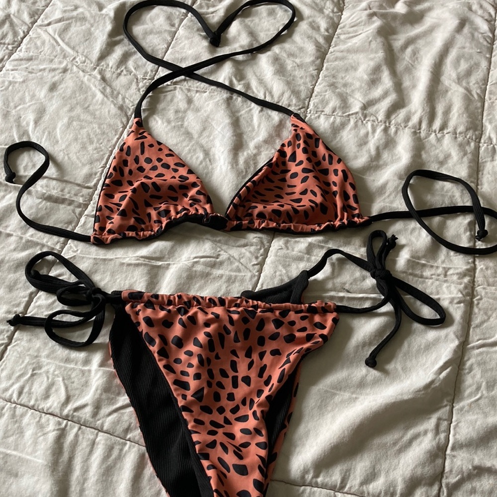 Reverse-able animal print swimsuit! Brazilian cut! Never been used!